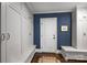 Functional mudroom with custom storage, built-in benches, and a stylish design at 2011 Fromby Ct, Charlotte, NC 28211