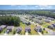 Beautiful neighborhood with lush greenery and well-maintained homes at 205 Falls Cove Dr, Troutman, NC 28166