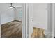 Bathroom and partial bedroom view features a tiled shower and hardwood floors and natural light at 232 Branchwood Cir, Kings Mountain, NC 28086