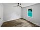 Bright bedroom featuring a ceiling fan, a large window with greenery, and ample natural light at 232 Branchwood Cir, Kings Mountain, NC 28086