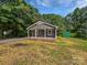 Charming home exterior featuring a welcoming front porch with white pillars and a well-manicured lawn at 232 Branchwood Cir, Kings Mountain, NC 28086