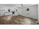 The open concept living room and kitchen area features hardwood floors and recessed lighting at 232 Branchwood Cir, Kings Mountain, NC 28086
