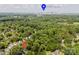 Aerial view showcasing property's proximity to Uptown Charlotte, surrounded by lush green trees and neighborhood at 3307 Draper Ave, Charlotte, NC 28205