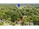 Aerial view of the property close to Charlotte Country Club surrounded by lush greenery and neighborhood charm at 3307 Draper Ave, Charlotte, NC 28205