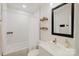 Bathroom with a tub and shower combination, updated vanity, and modern fixtures at 3307 Draper Ave, Charlotte, NC 28205