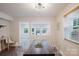 Bright dining room with an open concept view and plenty of natural light to create the perfect setting at 3307 Draper Ave, Charlotte, NC 28205