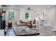 Inviting open-concept living space that blends living and dining area, with fireplace and stylish finishes at 3307 Draper Ave, Charlotte, NC 28205