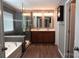 Bathroom featuring soaking tub, double vanity, wooden floors, and glass shower at 4003 Northerly Island Ct, Gastonia, NC 28056