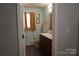 Bright bathroom featuring modern fixtures, a vanity with storage, and fresh paint at 4003 Northerly Island Ct, Gastonia, NC 28056