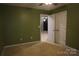 Welcoming bedroom with green walls and access to another room via double doors at 4003 Northerly Island Ct, Gastonia, NC 28056
