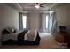 Spacious bedroom with a ceiling fan, carpet, and neutral walls at 4003 Northerly Island Ct, Gastonia, NC 28056