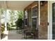Inviting front porch with stone accents and rocking chairs offers a relaxing outdoor space at 4003 Northerly Island Ct, Gastonia, NC 28056