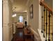 Hallway leads to a cozy living room featuring a fireplace and comfortable seating area at 4003 Northerly Island Ct, Gastonia, NC 28056