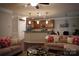 Cozy living room with comfortable seating, ceiling fan, and open floorplan at 4003 Northerly Island Ct, Gastonia, NC 28056