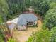 Expansive home boasts a large yard, set within a lush, private treed lot at 4028 Spindrift Cove Dr # 59 And 60, Denver, NC 28037