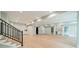 Finished basement with light wood floors, pot lights, a modern railing and a bar area great for entertaining at 4028 Spindrift Cove Dr # 59 And 60, Denver, NC 28037