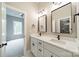 Modern bathroom with dual sinks, black hardware, and large mirrors at 4028 Spindrift Cove Dr # 59 And 60, Denver, NC 28037