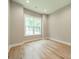Bedroom with a single window and neutral paint at 4028 Spindrift Cove Dr # 59 And 60, Denver, NC 28037