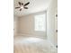 Neutral bedroom with a ceiling fan, window, and neutral carpet at 4028 Spindrift Cove Dr # 59 And 60, Denver, NC 28037