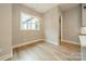 Cozy breakfast nook with hardwood floors, a modern light fixture, and plenty of natural light at 4028 Spindrift Cove Dr # 59 And 60, Denver, NC 28037