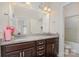 This bathroom features granite countertops, dual sinks and vanity at 410 Alucio Ct, Matthews, NC 28104