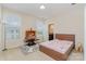 This bedroom features natural light, a bed and an accent rug at 410 Alucio Ct, Matthews, NC 28104