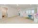 Bonus room area with an open floor plan and an adjacent bathroom at 410 Alucio Ct, Matthews, NC 28104