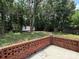Fenced backyard with a storage shed and patio, perfect for outdoor activities at 4402 Poxon Ln, Monroe, NC 28110