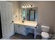 Bathroom featuring a vanity with white countertop and mirror at 4402 Poxon Ln, Monroe, NC 28110