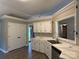 Charming kitchen features white cabinetry, sleek countertops, and modern stainless steel appliances at 4402 Poxon Ln, Monroe, NC 28110