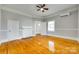 Well-lit bedroom with hardwood floors, offering a serene space with closet and doorway at 514 Jones St, Chester, SC 29706