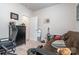 Bedroom with futon couch, desk, bureau, office chair, and decor at 5141 Grandview Dr, Fort Mill, SC 29707