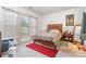 Serene bedroom with large window, plush carpeting, and comfortable furnishings at 5141 Grandview Dr, Fort Mill, SC 29707