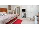 Spacious bedroom featuring a king bed, ample closet space, and ensuite bathroom access at 5141 Grandview Dr, Fort Mill, SC 29707
