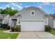 A well-maintained single-Gathering home with a two-car garage and a manicured lawn at 5141 Grandview Dr, Fort Mill, SC 29707
