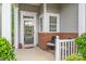 Inviting front porch with chairs, a seasonal wreath, and tasteful decor at 5141 Grandview Dr, Fort Mill, SC 29707