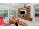 Spacious living room with a large entertainment center and sliding glass doors to the outside at 5141 Grandview Dr, Fort Mill, SC 29707