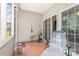 Covered porch with ceramic tile, sliding doors, outdoor furniture, and grill at 5141 Grandview Dr, Fort Mill, SC 29707