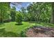A lush lawn provides space for outdoor seating at 5211 Londonderry Rd, Charlotte, NC 28210