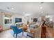 Bright and airy living room features hardwood floors, recessed lighting and an open floor plan at 5211 Londonderry Rd, Charlotte, NC 28210