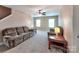 Bonus room with a ceiling fan, carpeted floors, and lots of space at 5797 Mcclintock Dr, Denver, NC 28037