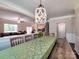 Open-concept dining area featuring a stylish light fixture and seamless flow to the living spaces at 5797 Mcclintock Dr, Denver, NC 28037