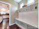 Mud room with coat rack, shelving, bench, and access to kitchen at 5797 Mcclintock Dr, Denver, NC 28037