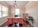 Bright and airy office space with ample natural light and classic hardwood floors at 5797 Mcclintock Dr, Denver, NC 28037
