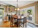 Inviting breakfast nook with a cozy dining table and access to an outdoor deck, perfect for relaxing at 6523 Alba Rose Ln, Huntersville, NC 28078