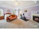 Spacious main bedroom with a sitting area, a fireplace, and a trey ceiling at 6523 Alba Rose Ln, Huntersville, NC 28078