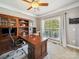 Charming home office with built-in shelves and ample natural light at 6523 Alba Rose Ln, Huntersville, NC 28078