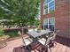 Outdoor patio with dining table and chairs, perfect for al fresco dining at 6523 Alba Rose Ln, Huntersville, NC 28078