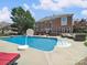 Swimming pool and outdoor living space. Perfect for summer entertaining at 6523 Alba Rose Ln, Huntersville, NC 28078