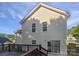 Home featuring a rear wooden deck, siding, and sliding glass doors to the backyard at 745 Erin Brook Ct, York, SC 29745